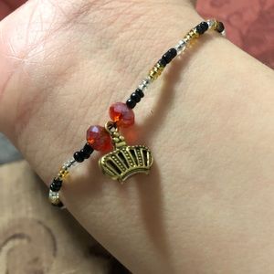 Homemade bracelet with crown charm
